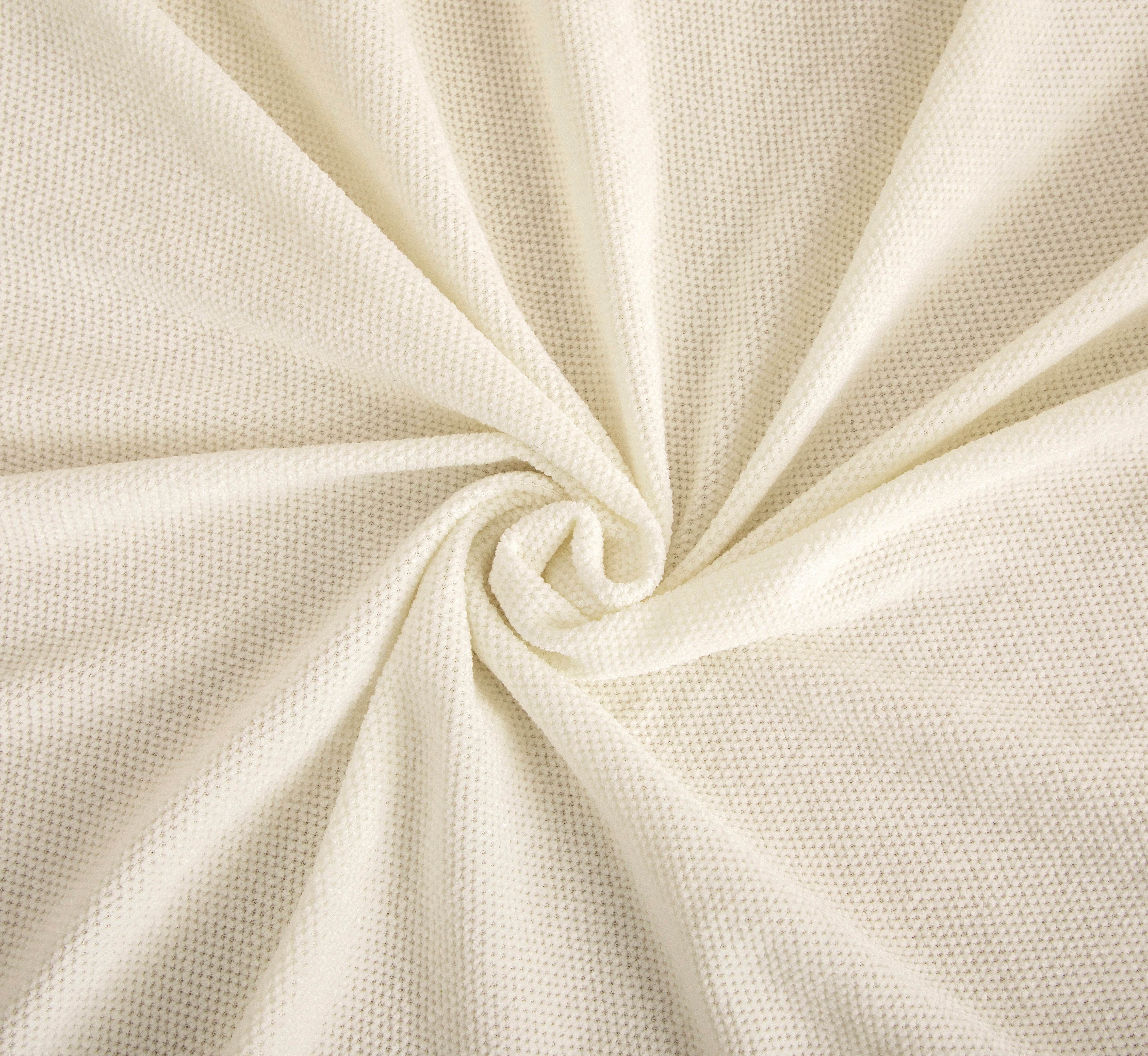Close-up of thick chenille fabric showing soft, plush texture in neutral cream
