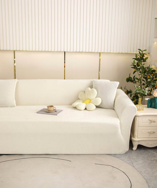 Ultra-soft Cozee Chenille sofa slipcover in cream, fitted on a 3-seater couch