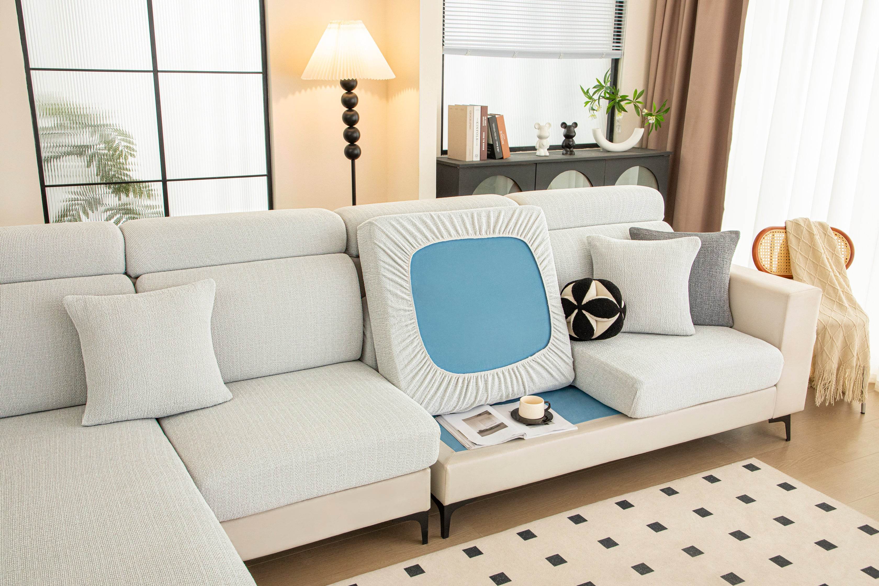 Back view of the Cozee Chenluxe Sofa Cover, highlighting its full coverage design, upgraded non-slip backing, and secure stretch fit for lasting sofa protection.