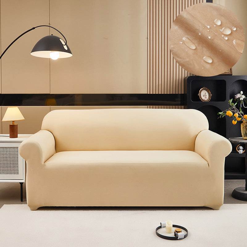 Sofa fitted with the Cozee Comfort Guard Slipcover, featuring a sleek, water-resistant fabric and snug 4-way stretch fit that protects against spills, stains, pet hair, and daily wear in busy homes