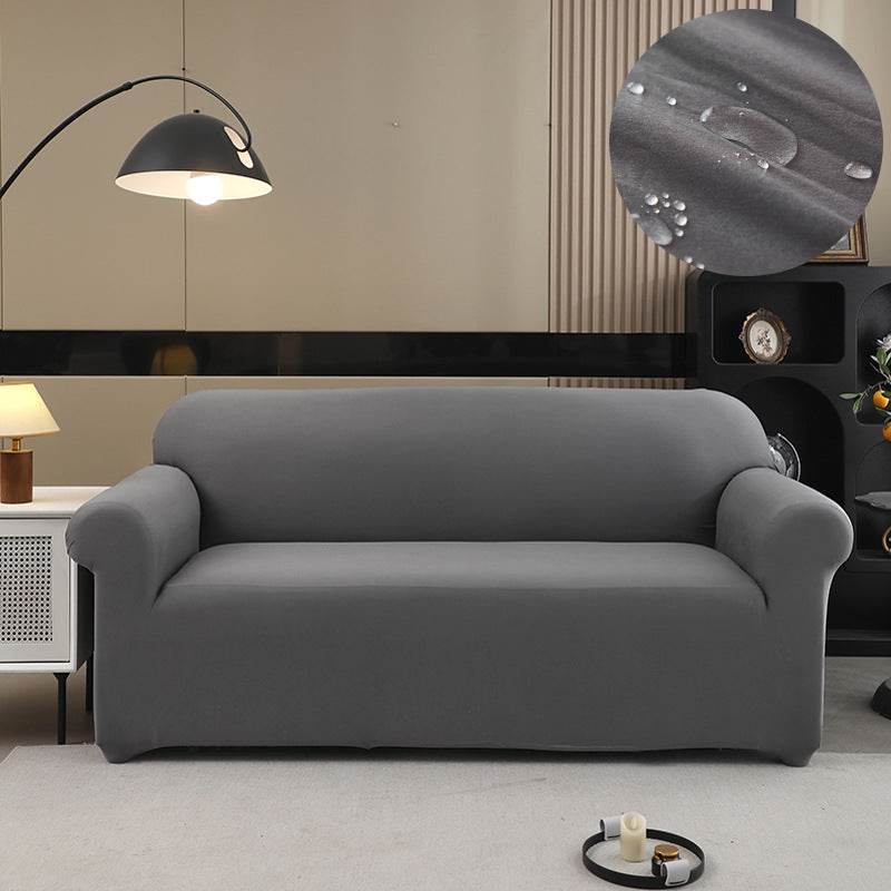 Sofa fitted with the Cozee Comfort Guard Slipcover, featuring a sleek, water-resistant fabric and snug 4-way stretch fit that protects against spills, stains, pet hair, and daily wear in busy homes