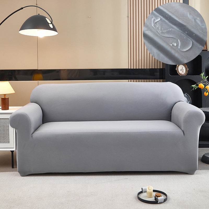 Sofa fitted with the Cozee Comfort Guard Slipcover, featuring a sleek, water-resistant fabric and snug 4-way stretch fit that protects against spills, stains, pet hair, and daily wear in busy homes