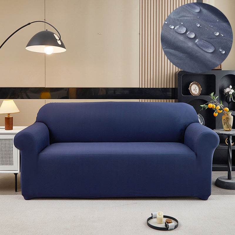 Sofa fitted with the Cozee Comfort Guard Slipcover, featuring a sleek, water-resistant fabric and snug 4-way stretch fit that protects against spills, stains, pet hair, and daily wear in busy homes