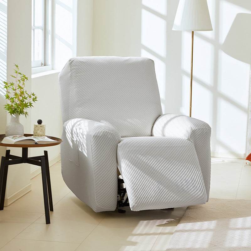 Full-coverage recliner slipcover made from cooling, stretchy fabric that protects against spills, pet hair, and everyday wear while staying snug and comfortable