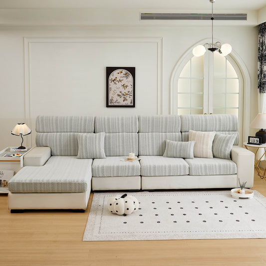 Cozee Herringbone Sofa Cover on a sofa, featuring a premium herringbone weave with extra-thick, soft fabric for durable everyday protection.