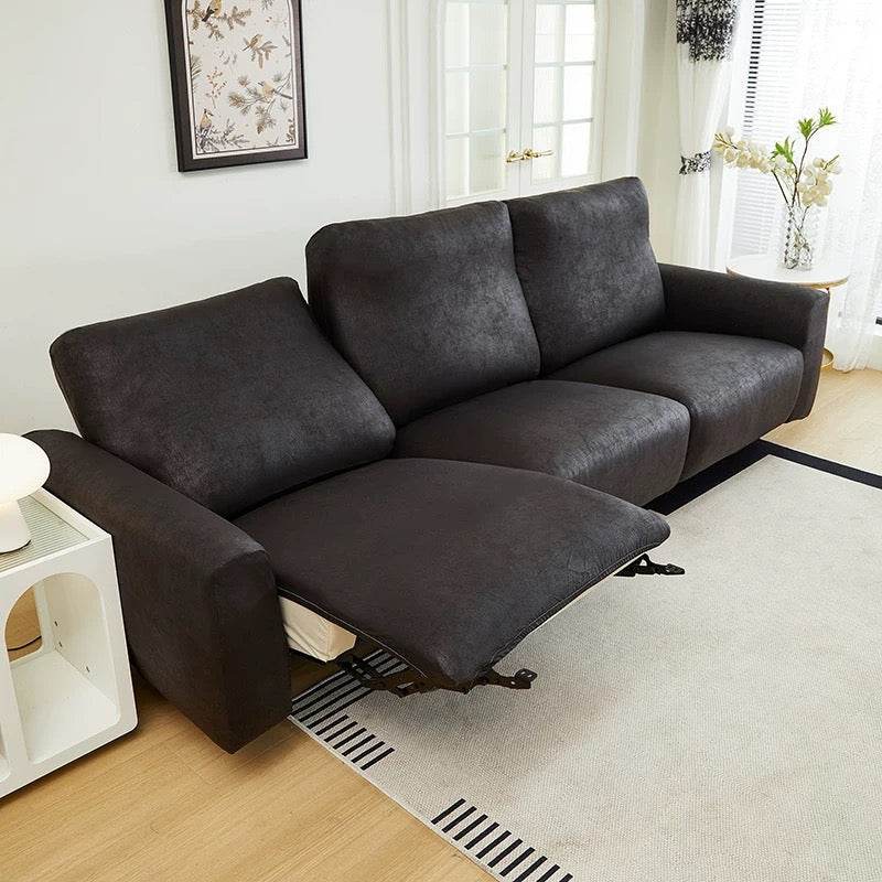 Full view of 3-seater sofa with recliner extended, featuring the Cozee Lux slipcover stretched smoothly over the entire sofa for complete coverage and a snug, stay-put fit
