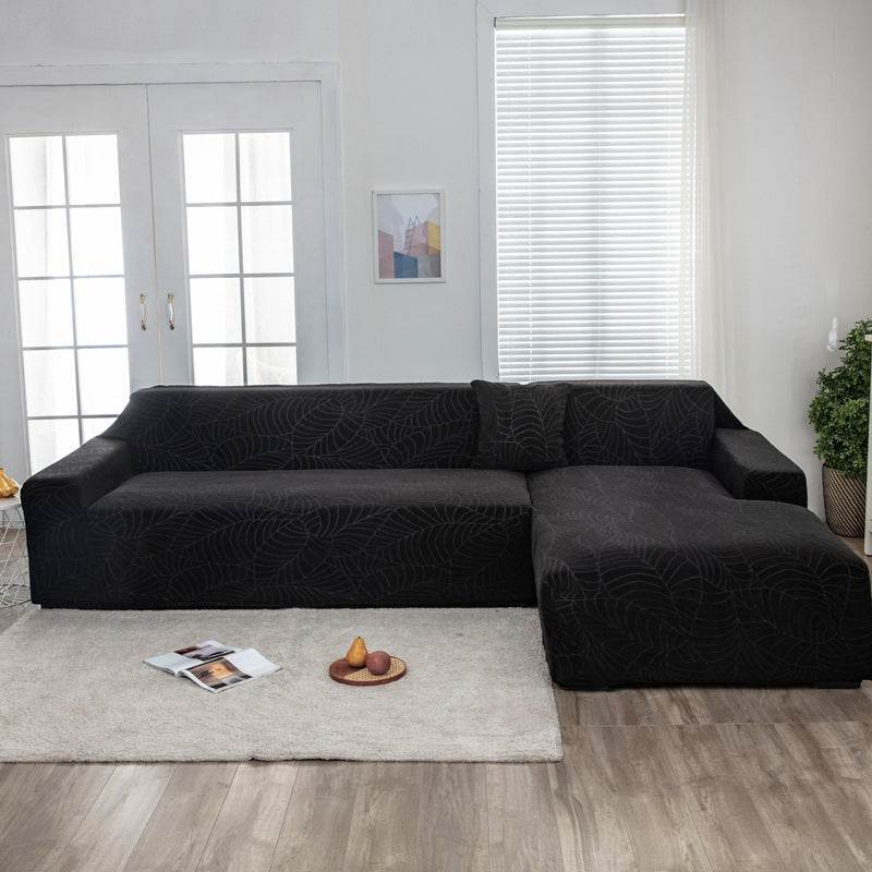 Full view of a sofa fitted with the Cozee SoftWeave Slipcover, featuring soft stretch fabric for a smooth, tailored fit that protects against spills, stains, and daily wear—perfect for busy homes