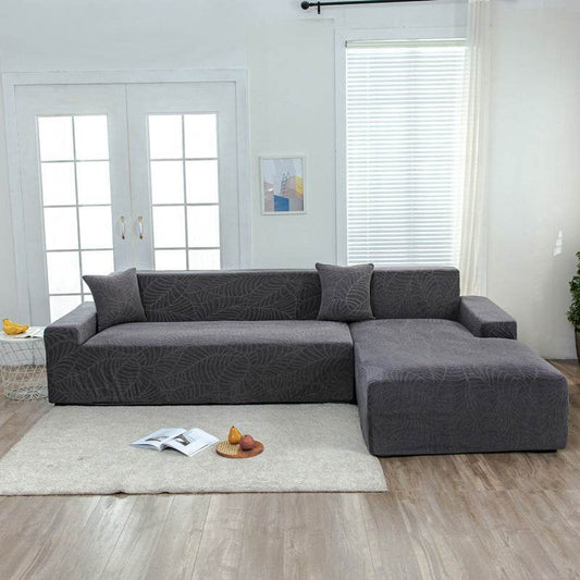 Full view of a sofa fitted with the Cozee SoftWeave Slipcover, featuring soft stretch fabric for a smooth, tailored fit that protects against spills, stains, and daily wear—perfect for busy homes