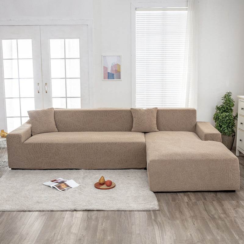 Full view of a sofa fitted with the Cozee SoftWeave Slipcover, featuring soft stretch fabric for a smooth, tailored fit that protects against spills, stains, and daily wear—perfect for busy homes
