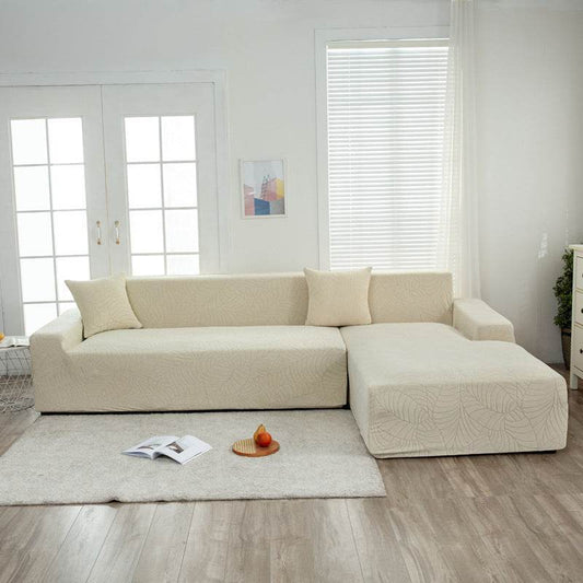 Full view of a sofa fitted with the Cozee SoftWeave Slipcover, featuring soft stretch fabric for a smooth, tailored fit that protects against spills, stains, and daily wear—perfect for busy homes