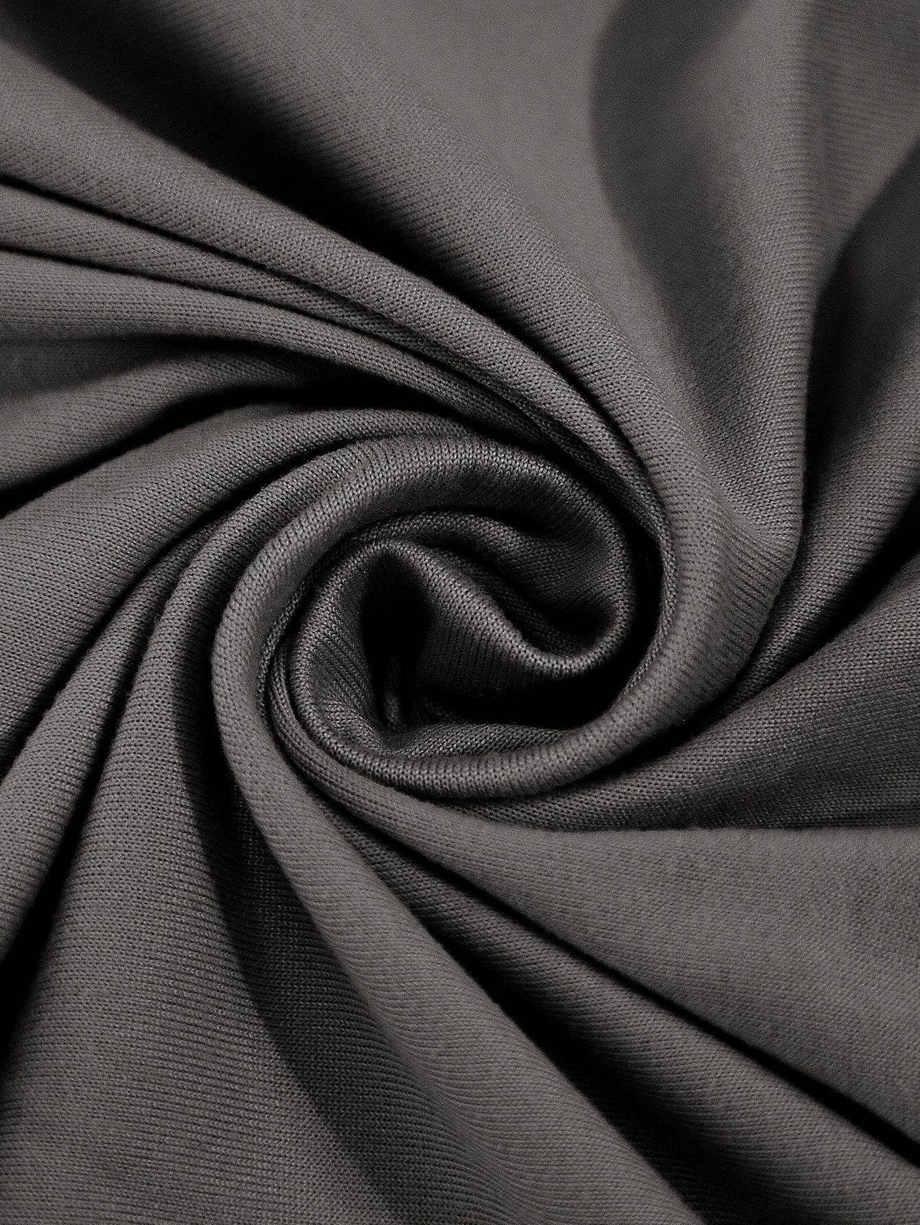Close-up of stretch chair cover fabric with soft folds, showcasing the flexible material and smooth drape of the Cozee Stretch Fit Chair Cover
