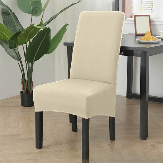 Dining chair fitted with the Cozee Stretch Fit Chair Cover, featuring a smooth, snug fit with soft stretchy fabric that protects against spills, stains, and daily wear