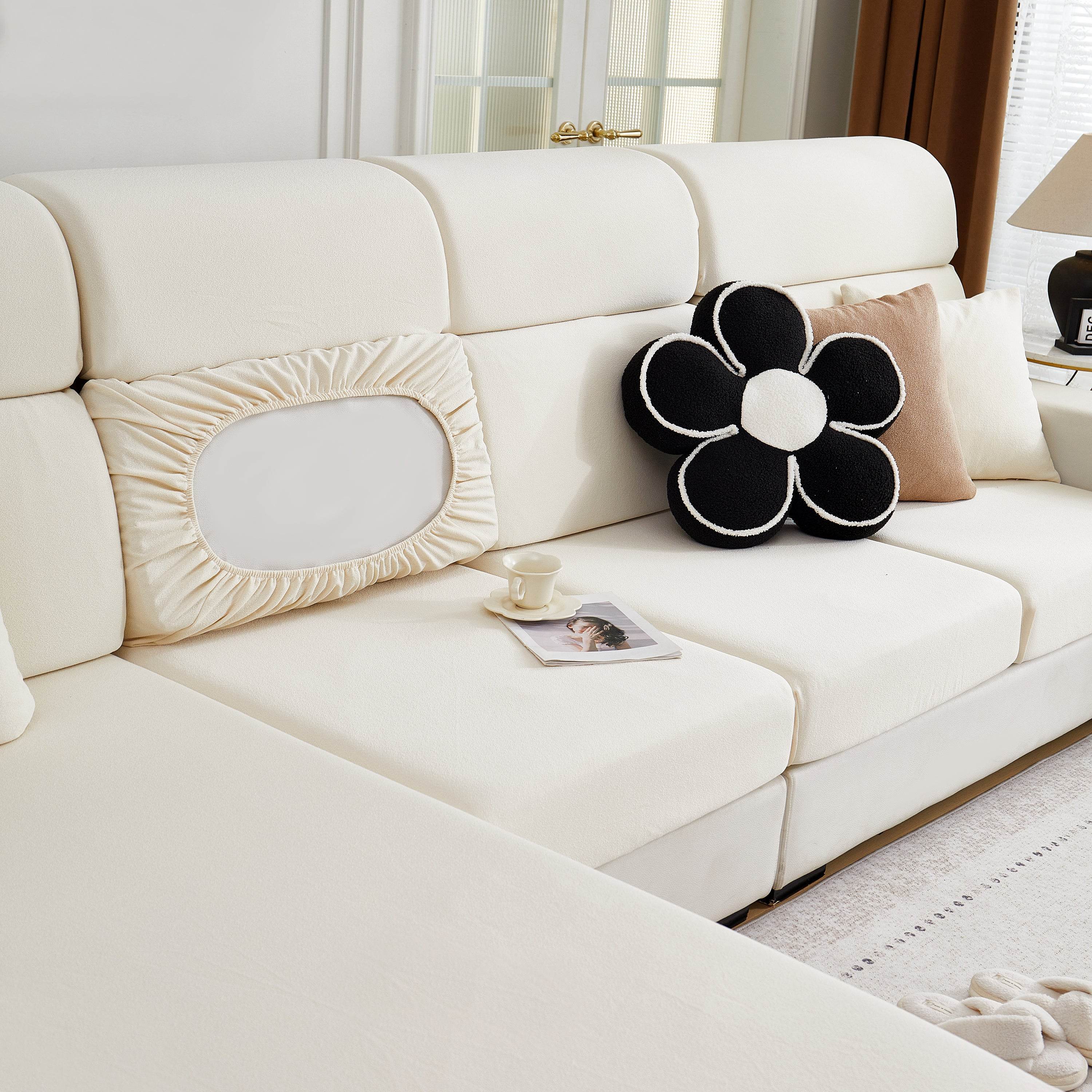 Cozee Teddy Plush Sofa Cover on a sectional sofa in a cozy living room setting, showcasing soft texture and full coverage for modern home décor.
