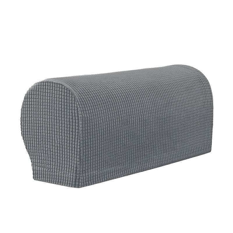 Close-up of a sofa arm fitted with the Cozee Timeless Arm Cover, featuring ultra-soft fleece fabric and a snug, stretchable fit that protects armrests from spills, dust, and pet hair