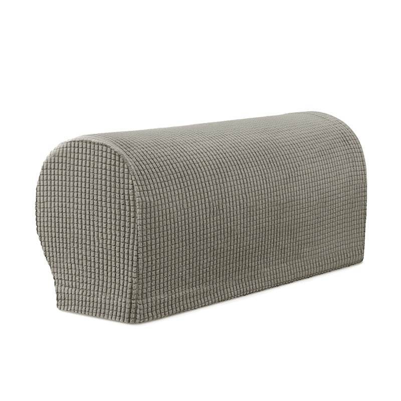 Close-up of a sofa arm fitted with the Cozee Timeless Arm Cover, featuring ultra-soft fleece fabric and a snug, stretchable fit that protects armrests from spills, dust, and pet hair