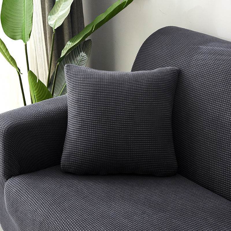 Plush sofa pillow covered in matching ultra-soft fabric from the Cozee Timeless Slipcover collection, adding coordinated comfort and style to any living space