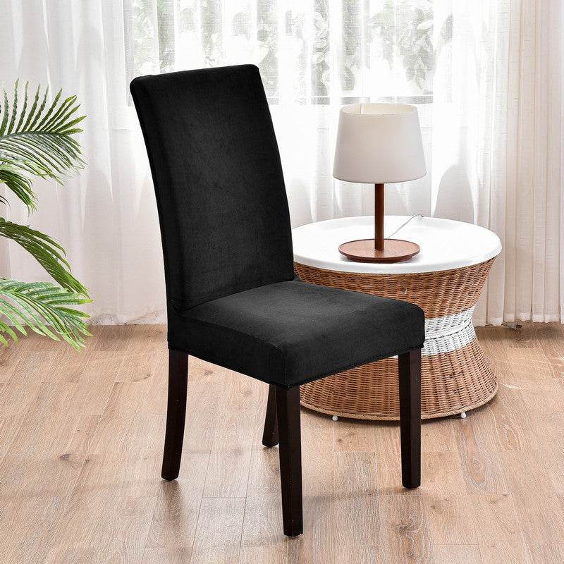 Full view of a chair covered with the Cozee Ultra Soft Plush Chair Cover, featuring a soft microfiber fleece fabric and snug stretch fit that protects against stains, spills, and daily wear