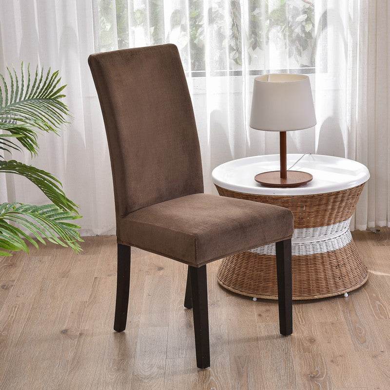 Full view of a chair covered with the Cozee Ultra Soft Plush Chair Cover, featuring a soft microfiber fleece fabric and snug stretch fit that protects against stains, spills, and daily wear