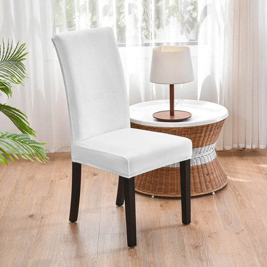Full view of a chair covered with the Cozee Ultra Soft Plush Chair Cover, featuring a soft microfiber fleece fabric and snug stretch fit that protects against stains, spills, and daily wear