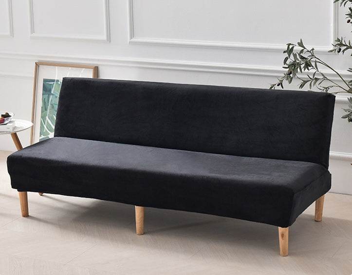 Full view of futon covered with the Cozee Ultra Soft Plush Slipcover, featuring a smooth, tailored fit with cozy microfiber fleece fabric for comfort and all-around protection