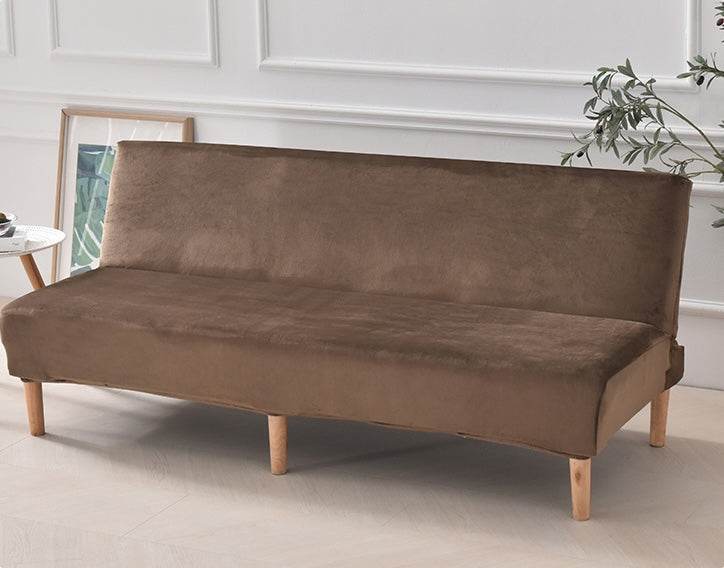 Full view of futon covered with the Cozee Ultra Soft Plush Slipcover, featuring a smooth, tailored fit with cozy microfiber fleece fabric for comfort and all-around protection