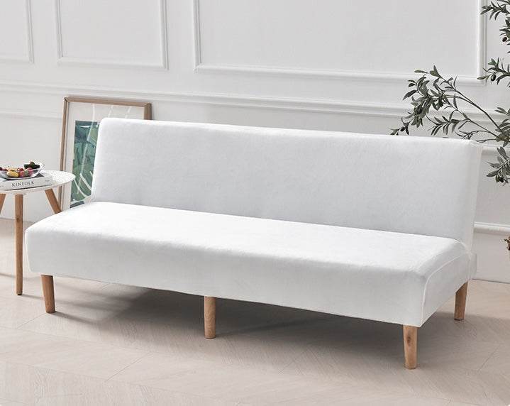 Full view of futon covered with the Cozee Ultra Soft Plush Slipcover, featuring a smooth, tailored fit with cozy microfiber fleece fabric for comfort and all-around protection