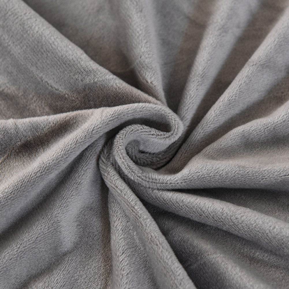 Close-up of ultra soft plush fabric with gentle folds, highlighting the cozy texture and flexible drape of the Cozee Ultra Soft Plush Slipcover