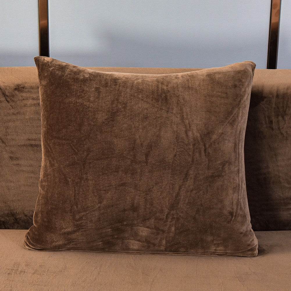 Full view of a sofa pillow covered in plush, velvety fabric, showcasing the soft texture and coordinated design of the Cozee Ultra Soft Plush Slipcover set