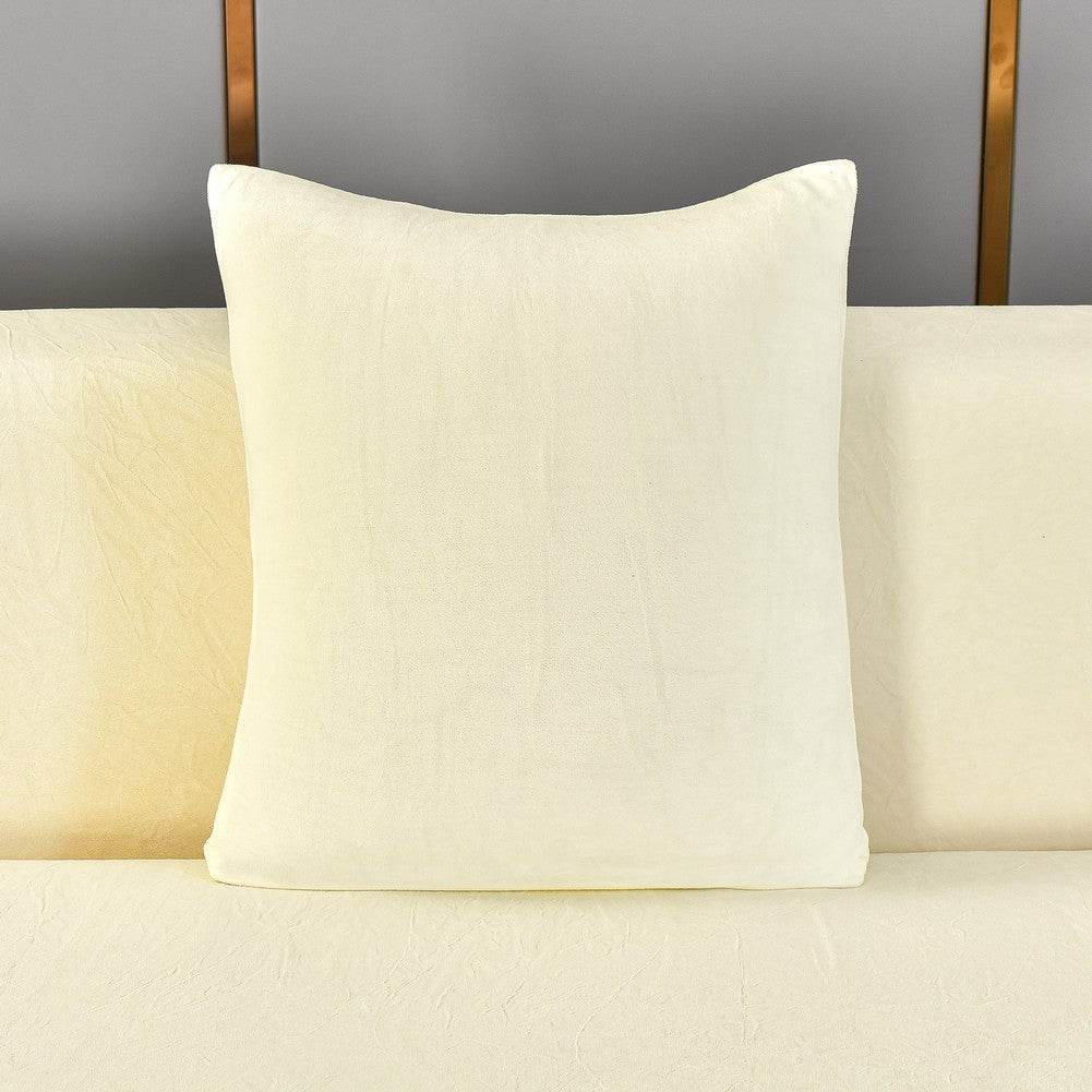 Full view of a sofa pillow covered in plush, velvety fabric, showcasing the soft texture and coordinated design of the Cozee Ultra Soft Plush Slipcover set