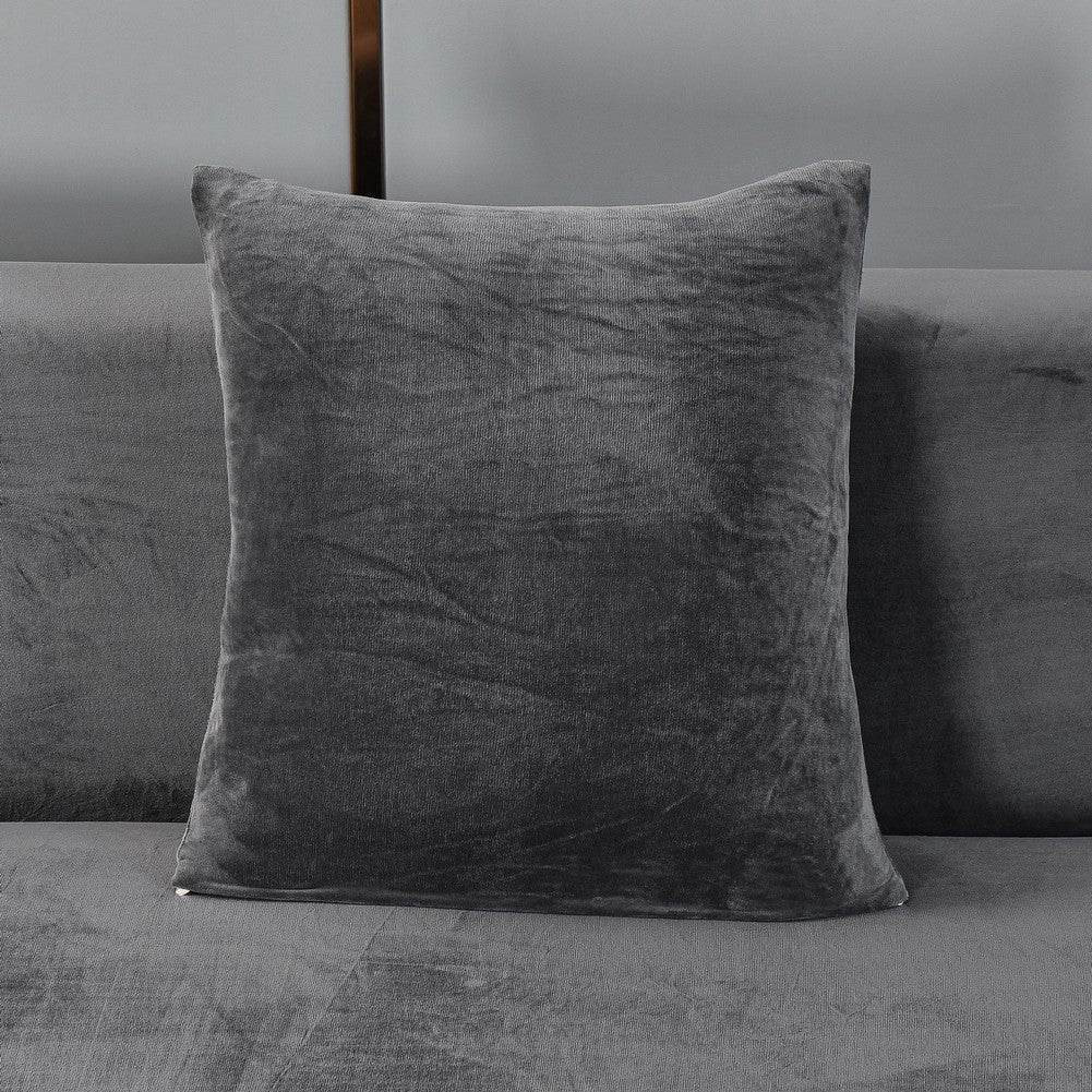 Full view of a sofa pillow covered in plush, velvety fabric, showcasing the soft texture and coordinated design of the Cozee Ultra Soft Plush Slipcover set