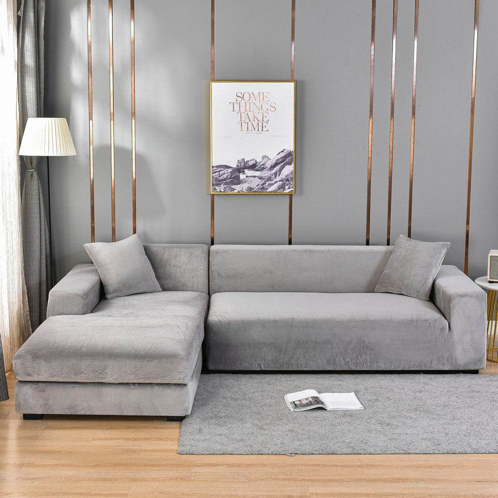 Sofa wrapped in the Cozee Ultra Soft Plush Slipcover, featuring velvety fabric and a snug 4-way stretch fit that offers full coverage and protection from spills, pet hair, and daily wear
