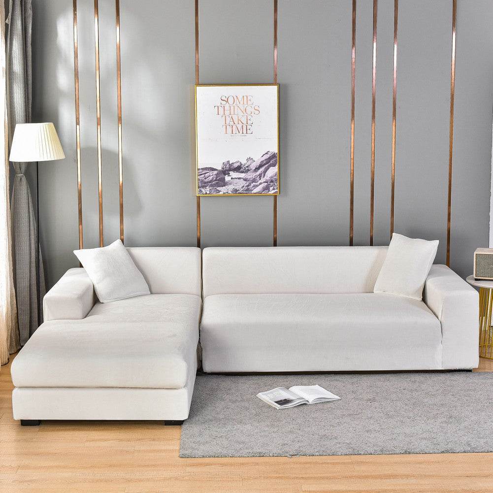 Sofa wrapped in the Cozee Ultra Soft Plush Slipcover, featuring velvety fabric and a snug 4-way stretch fit that offers full coverage and protection from spills, pet hair, and daily wear
