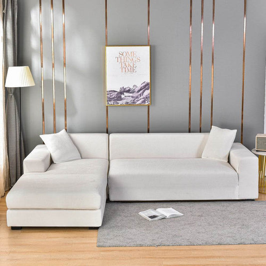 Sofa wrapped in the Cozee Ultra Soft Plush Slipcover, featuring velvety fabric and a snug 4-way stretch fit that offers full coverage and protection from spills, pet hair, and daily wear